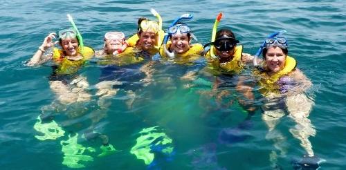 Photos of students in crystal clear water in Panama